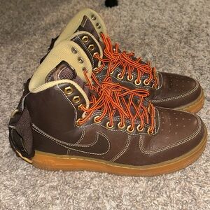 Brown air forces with orange laces big kids size 5y